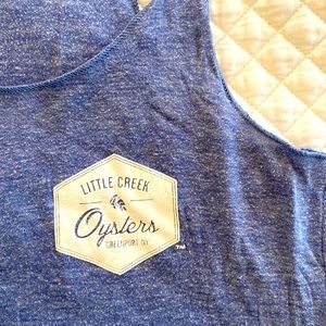 Muscle tank, blue chambray heather. Gently worn. Graphic front & back. Womens L